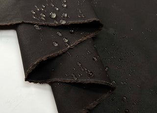 12oz_Waxed_Cotton_Brown_British_Water_Resistant_Coating_Fabric_Close_Up_Splash