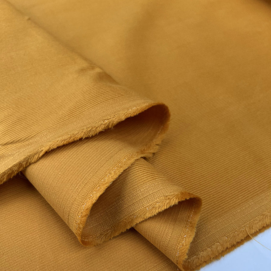 21 wale needlecord ochre yellow cotton corduroy woven shirting fabric fold