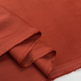 21 wale needlecord terracotta orange cotton corduroy woven shirting fabric fold