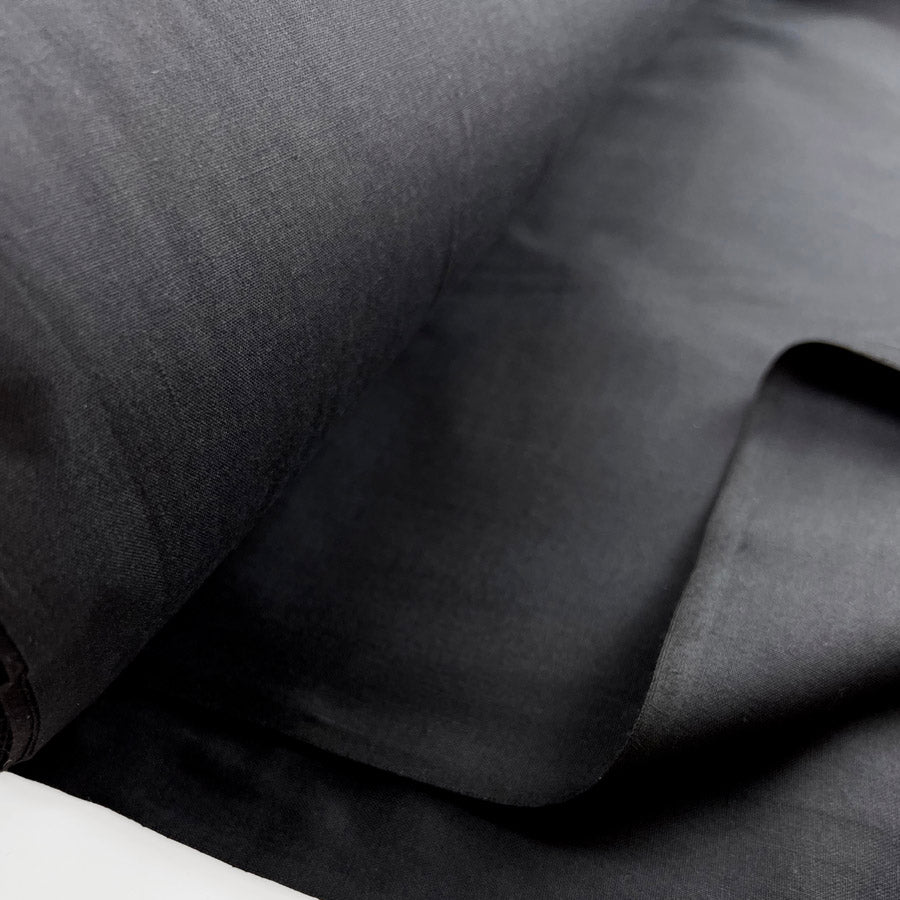 238cm Wide Polycotton Sheeting Fabric Plain Black Fold
