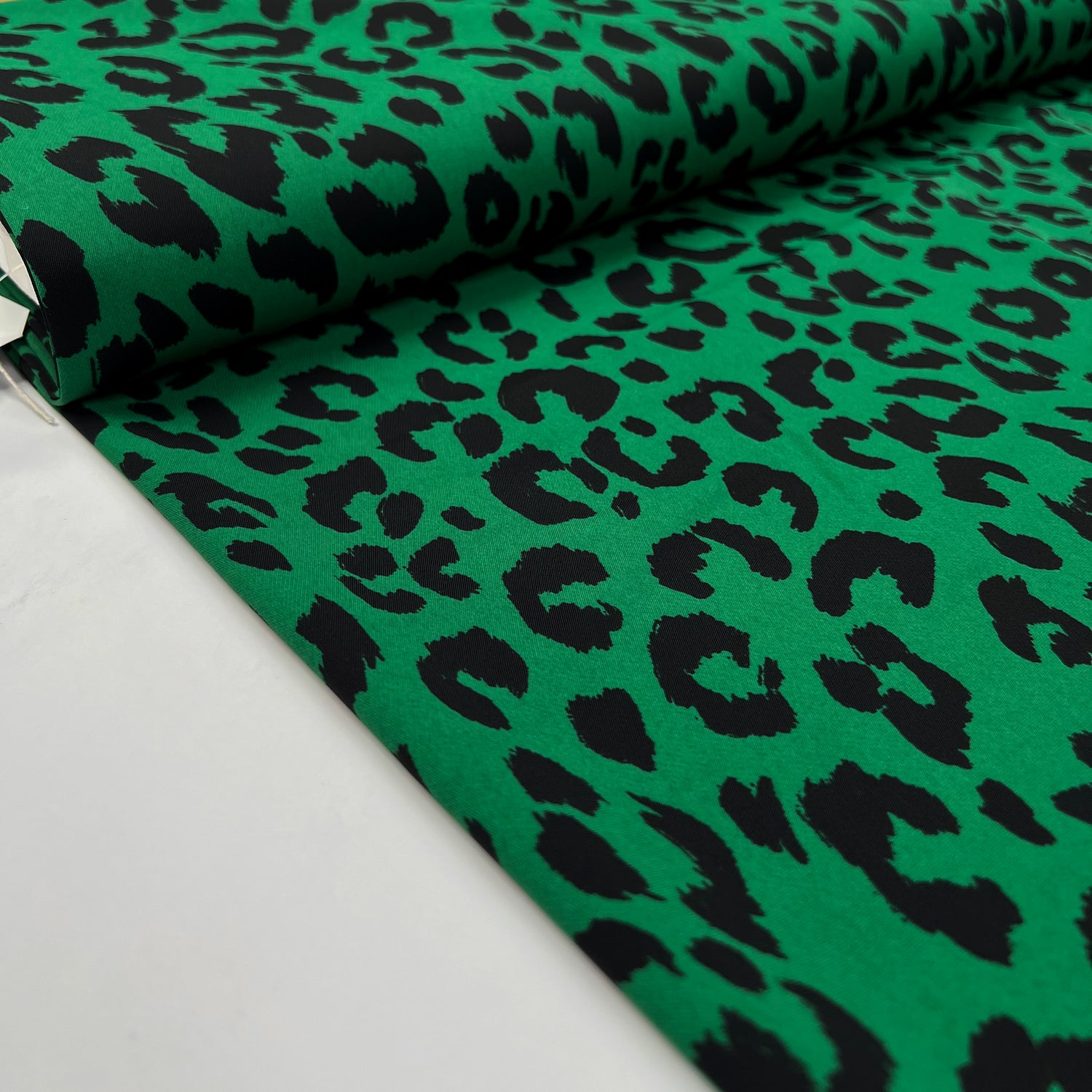 After Dark Green Polyester Elastane Twill Stretch Black Animal Print Dress Fabric Bolt