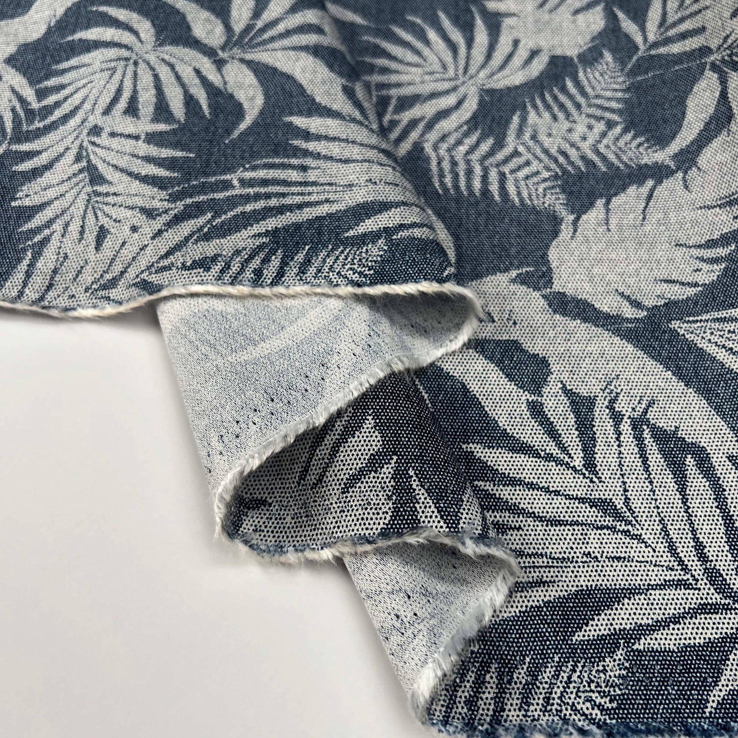 Airflow_Viscose_Denim_Palm_Blue_Leaf_Viscose_Polyamide_130gsm_Dress_Fabric_Fold