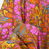 Bold Floral Paisley Orange and Pink Viscose Abstract Dress Fabric Close Up