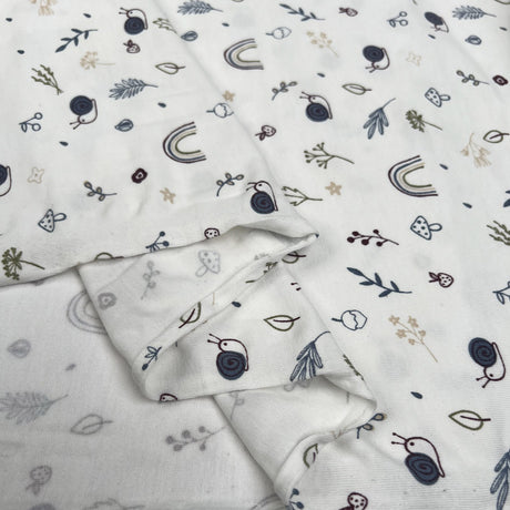 Cotton Jersey Natures Best Cream Animal Print Elastane Knit Fabric Fold