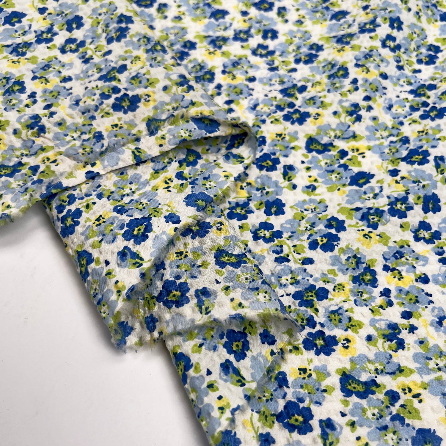 Cotton Seersucker Cottage Garden White Blue Green Small Floral Dress Fabric Fold