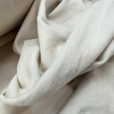 Cream Brushed Back Cotton Jersey Fabric Skims Close up