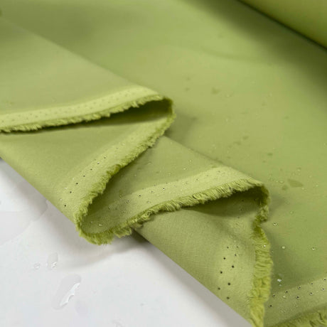 Driden Romano 8oz Waxed Cotton Apple Green British Millerain Fabric Fold
