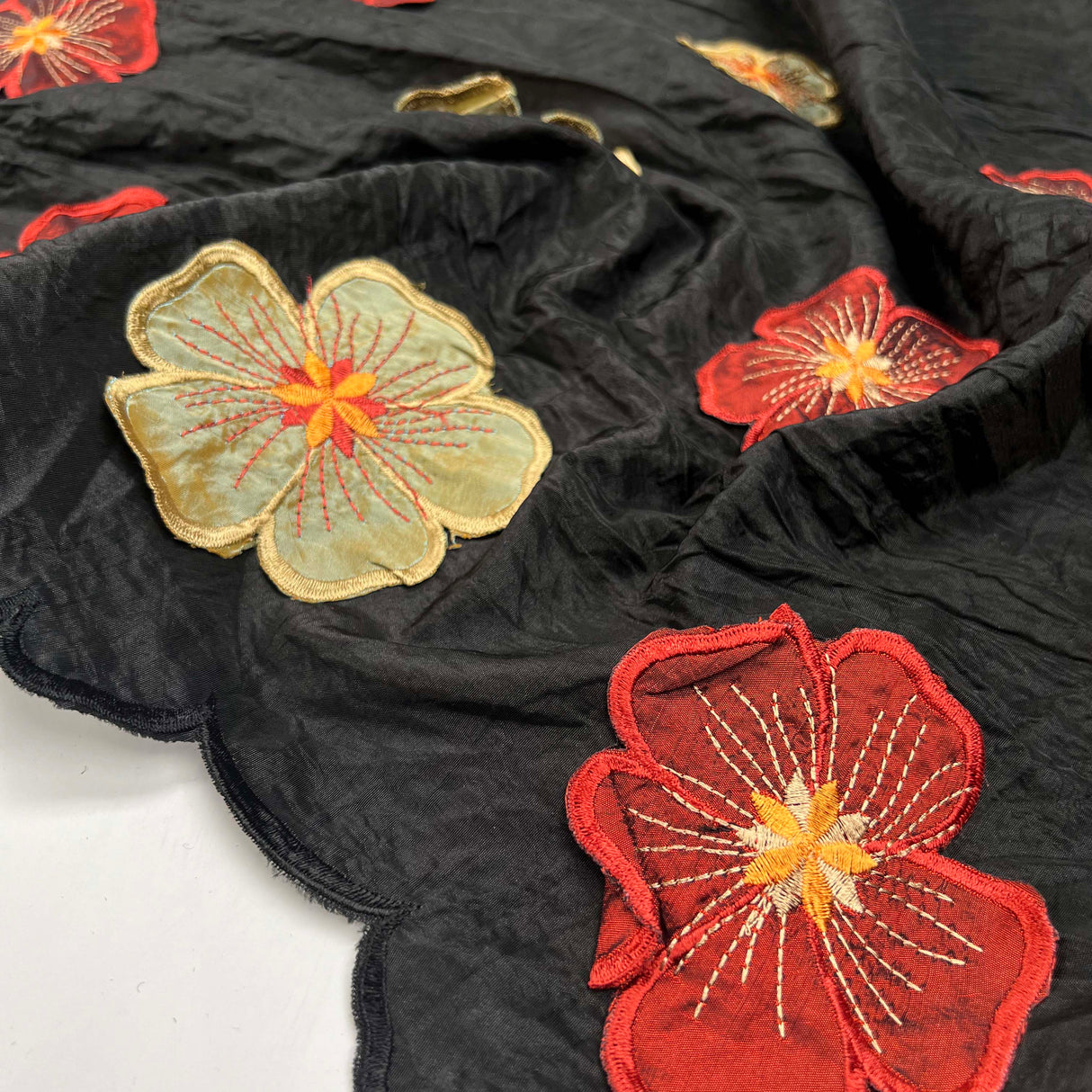Embroidered_Taffeta_Samira_Polyester_Black_Floral_Red_Cream_Border_Dress_Fabric_Close_up
