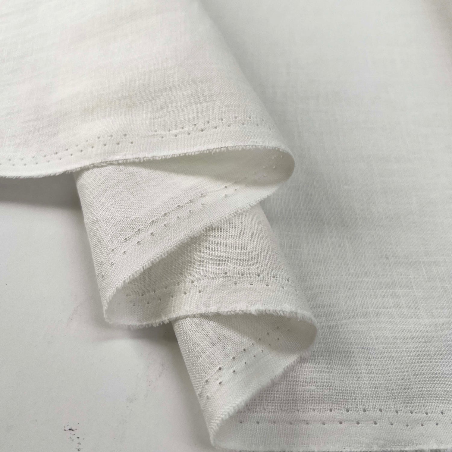 French_Linen_White_Plain_Woven_Dress_Fabric_Fold