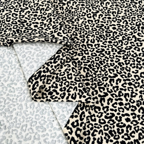 French Terry Baby Leopard Cotton Elastane Beige Black Animal Print Knit Jersey Fabric Fold