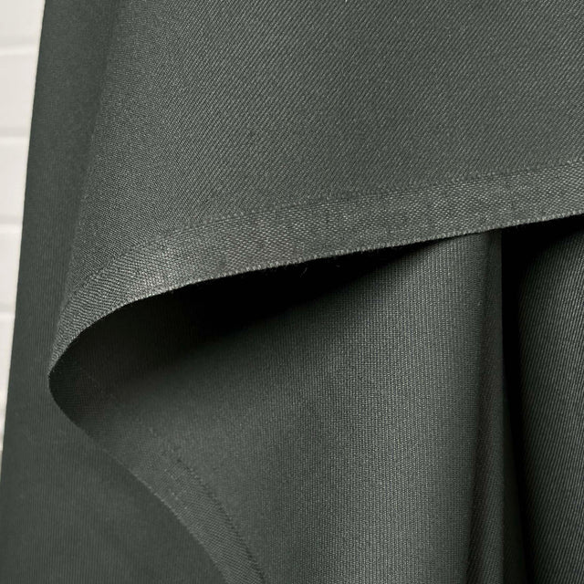 Gambrella Polyester Wool Green Fine Twill Suiting Fabric Hang