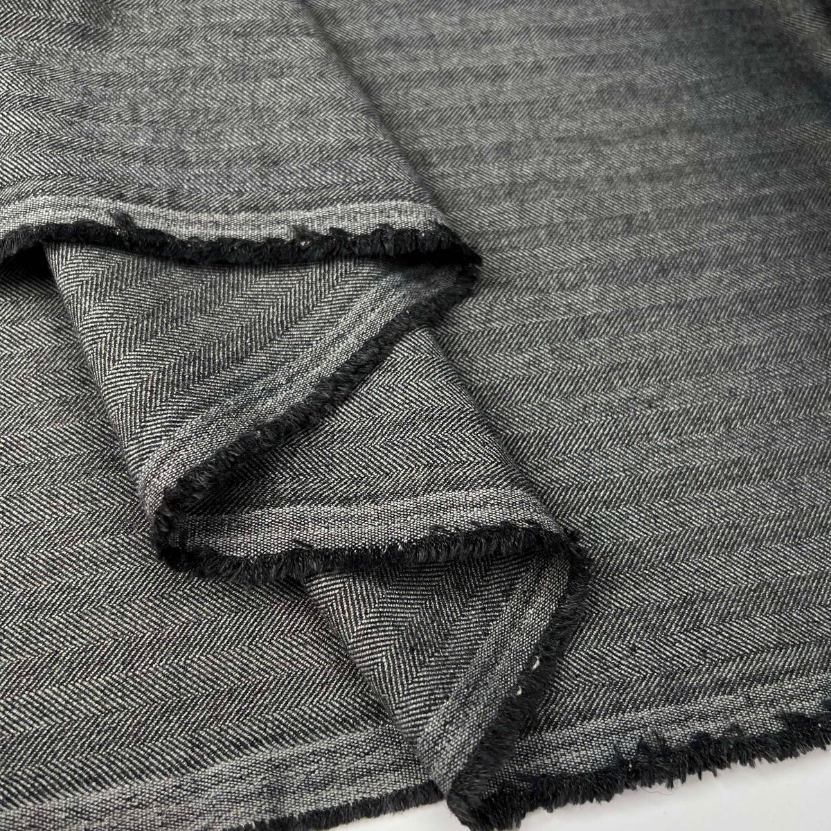 Happy Harry Viscose Blend Grey Herringbone Stretch Suiting Fabric
Fold
