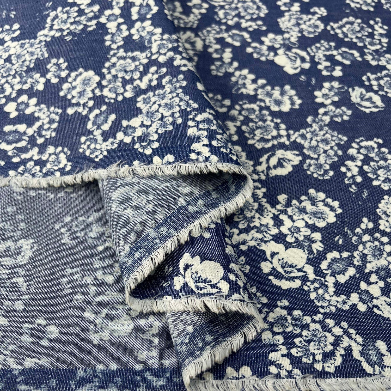 Heavenly Bouquet Cotton Denim Chambray Blue White Floral Print Lightweight Woven Dress Fabric Fold