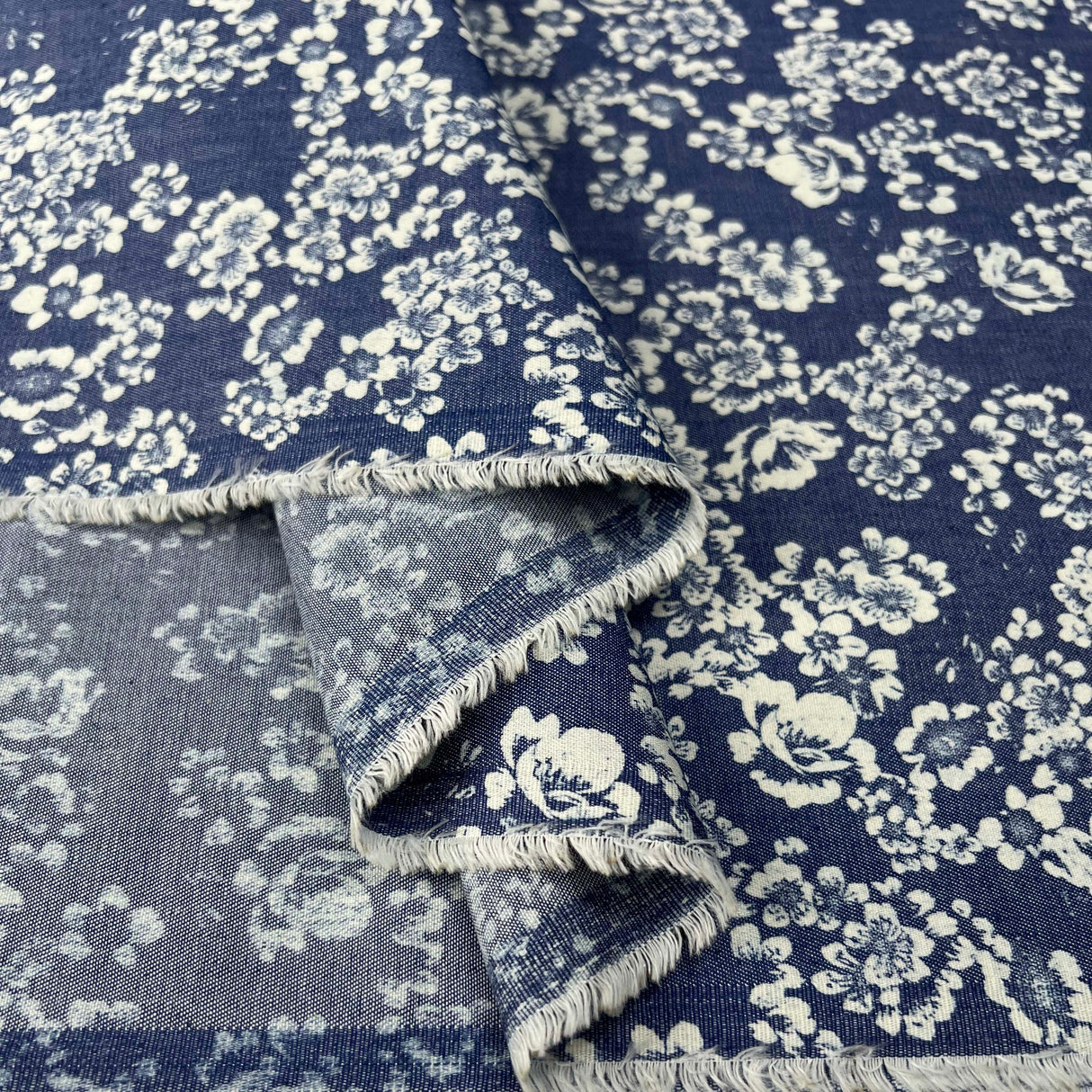 Heavenly Bouquet Cotton Denim Chambray Blue White Floral Print Lightweight Woven Dress Fabric Fold