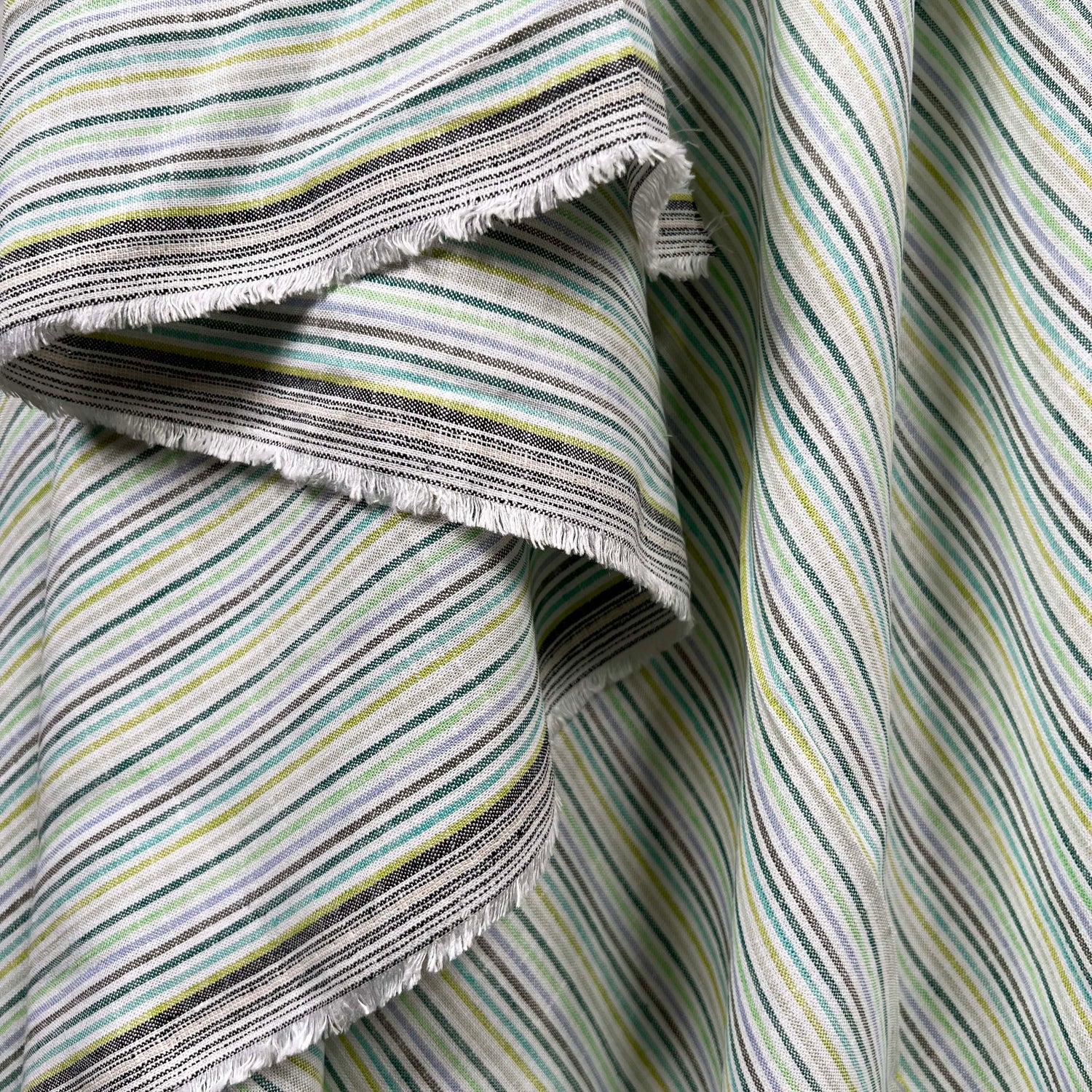 Helter Skelter Lagoon Green Viscose Linen Stripe Woven Dress Fabric Hang