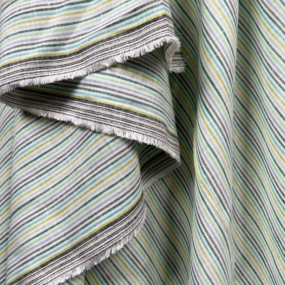 Helter Skelter Lagoon Green Viscose Linen Stripe Woven Dress Fabric Hang