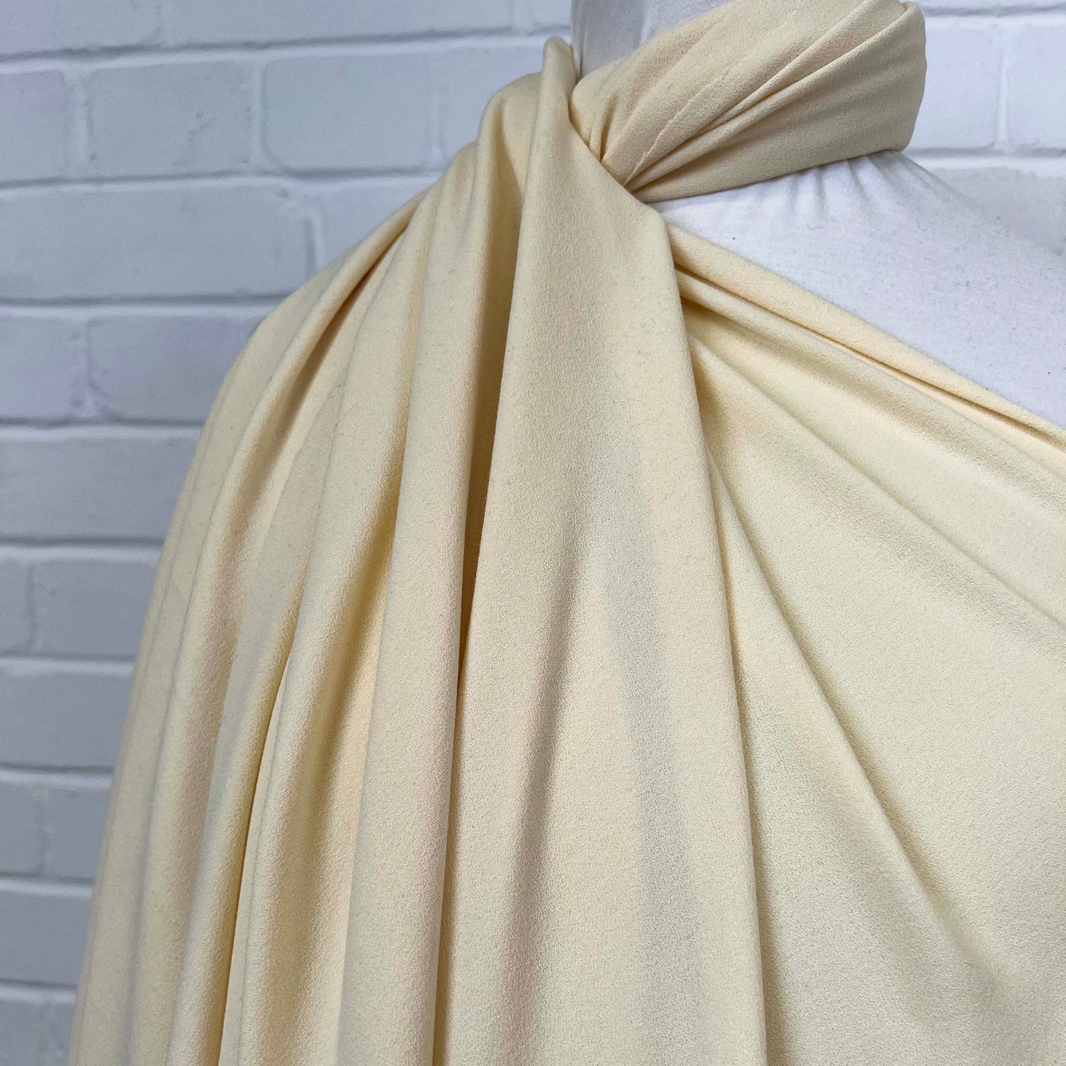 Soft Stretch Textured Dressmaking Fabric Italian Crepe Cream Side