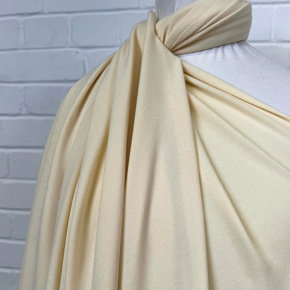 Soft Stretch Textured Dressmaking Fabric Italian Crepe Cream Side