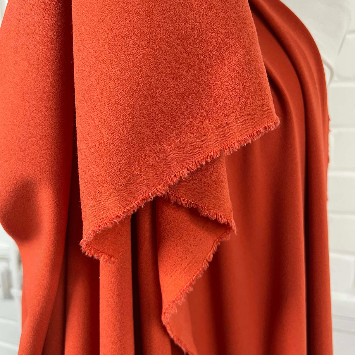 Soft Textured Stretch Dressmaking Fabric | Italian Crepe - Rust Hang
