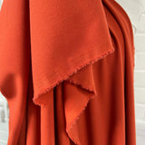 Soft Textured Stretch Dressmaking Fabric | Italian Crepe - Rust Hang