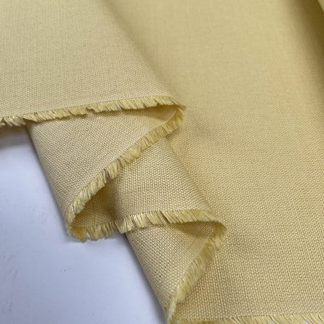 Laura Ashley Austen Sunshine Yellow Linen Cotton Canvas Plain Furnishing Fabric Fold