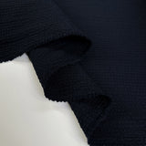 Linea Nero Polyester Seersucker Ex Designer Fabric Fold