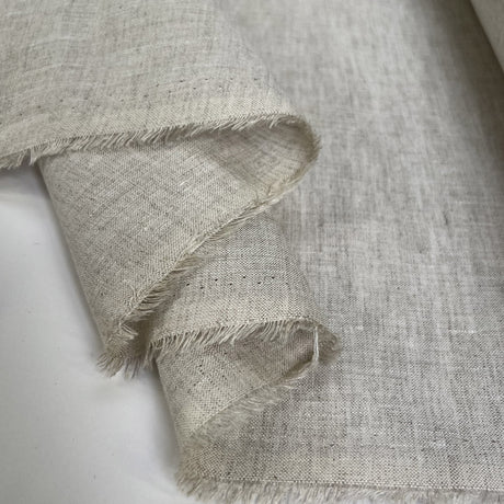 Linen Line Ecru Plain Woven Dress Fabric Fold