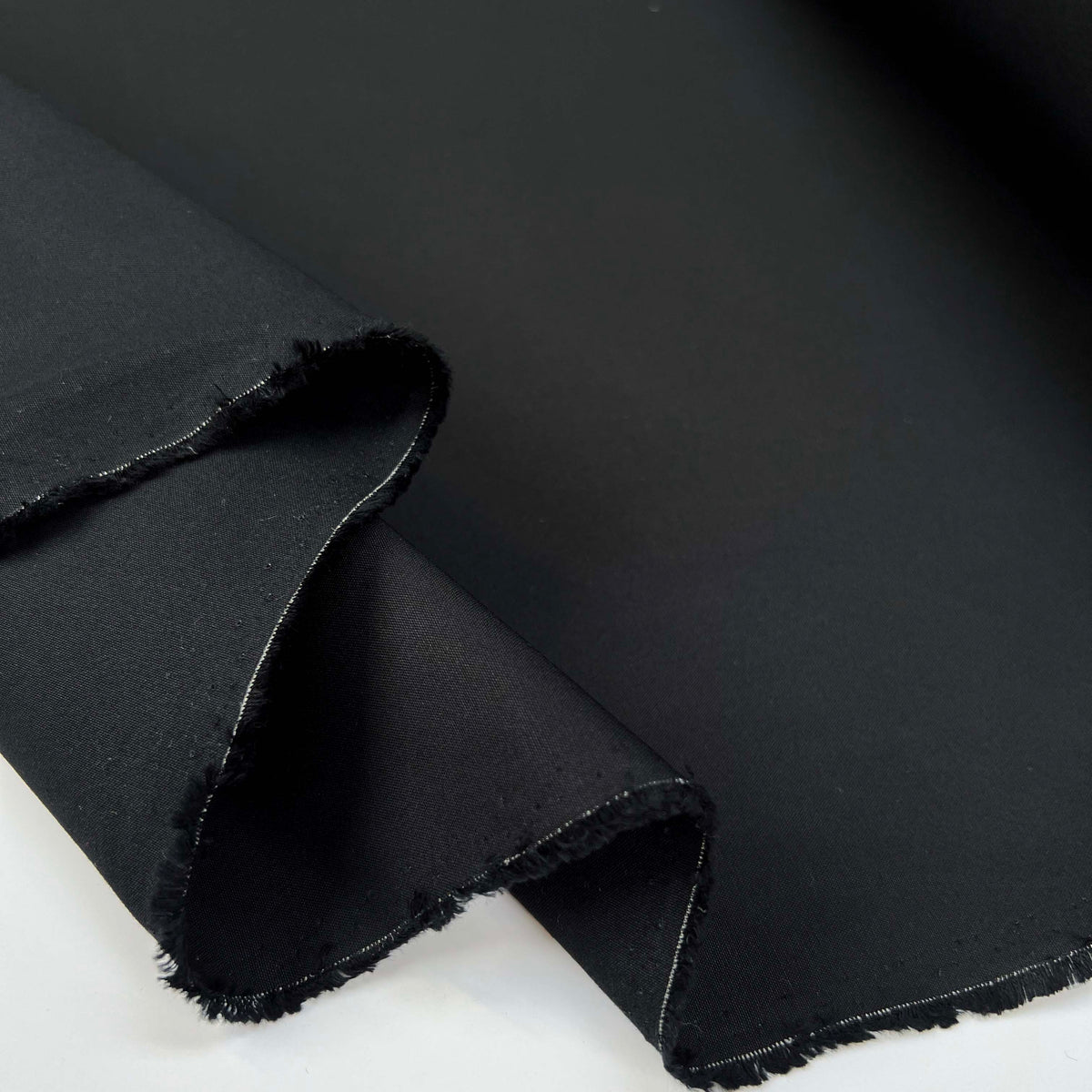 Looking Forward Black Cotton Water Resistant Trouser Fabric Fold
