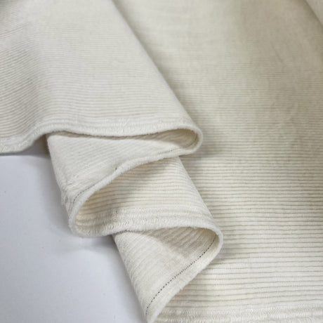 Milano Cord Ivory Cotton Elastane 10 Wale Italian Ex Designer Stretch Woven Trouser Fabric Fold