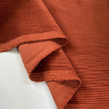 Milano Cord Rust Cotton Elastane 10 Wale Italian Ex Designer Stretch Woven Trouser Fabric Fold