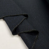 Moody Blues Polyester Wool Mix Blue Black Herringbone Suiting Fabric Fold