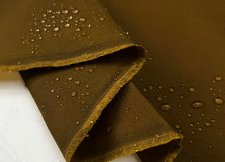 Oil_Finish_Tin_Cloth_Tan_Waxed_Cotton_Water_Resistant_British_Coating_Fabric_Fold_Splash