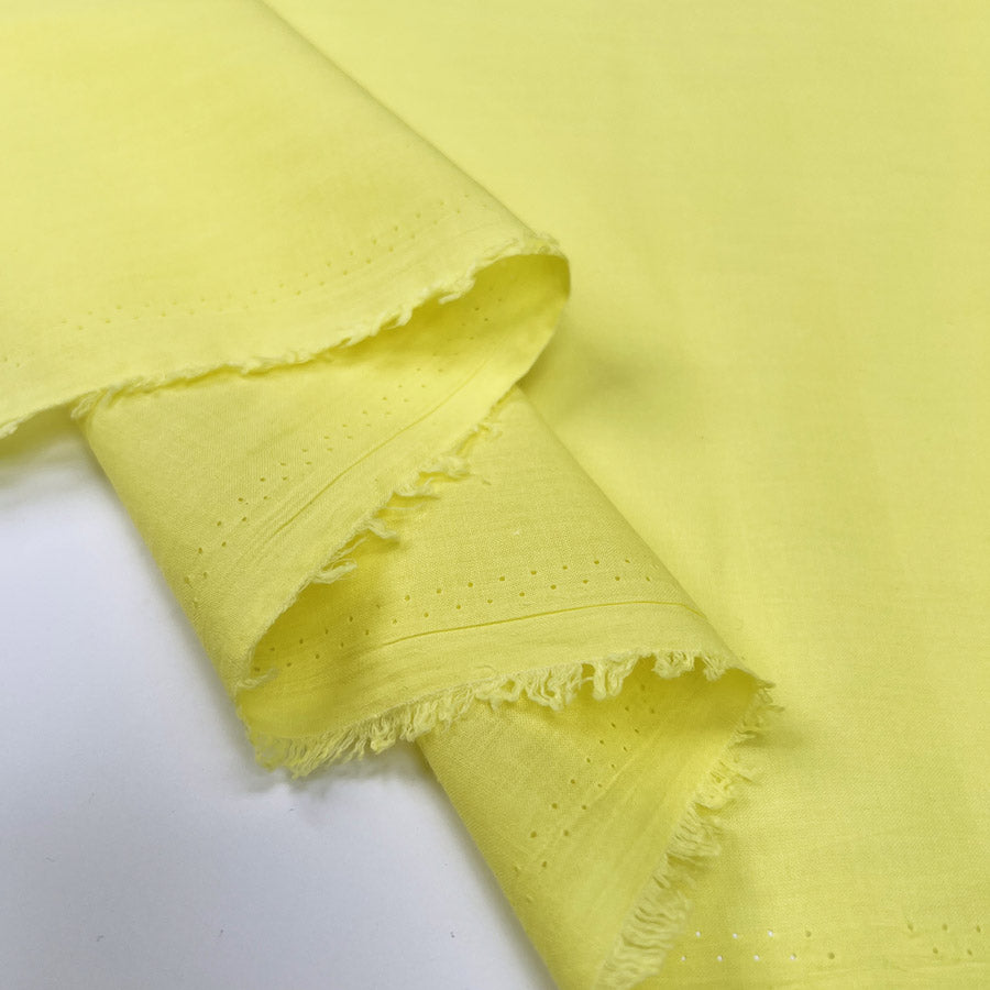 Pennine Cotton Lawn Canary Yellow Plain Woven Fine Lightweight Dress Fabric Fold