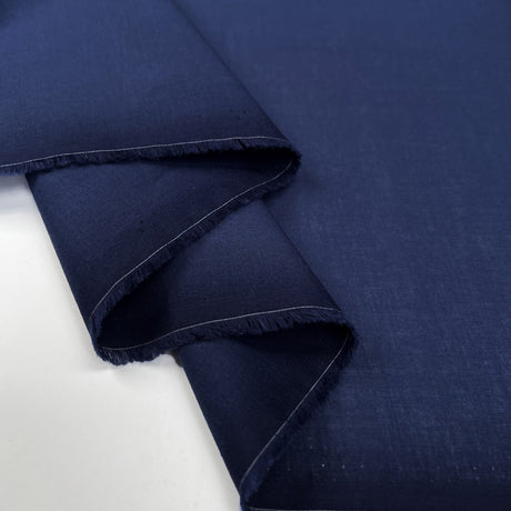 Pennine Cotton Lawn Navy Plain Woven Fine Lightweight Dress Fabric Fold