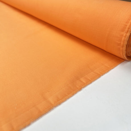 Pennine Cotton Lawn Orange Plain Woven Fine Lightweight Dress Fabric Roll