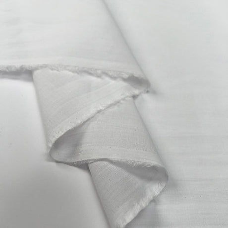 Pennine Cotton Lawn White Plain Woven Fine Lightweight Dress Fabric Fold