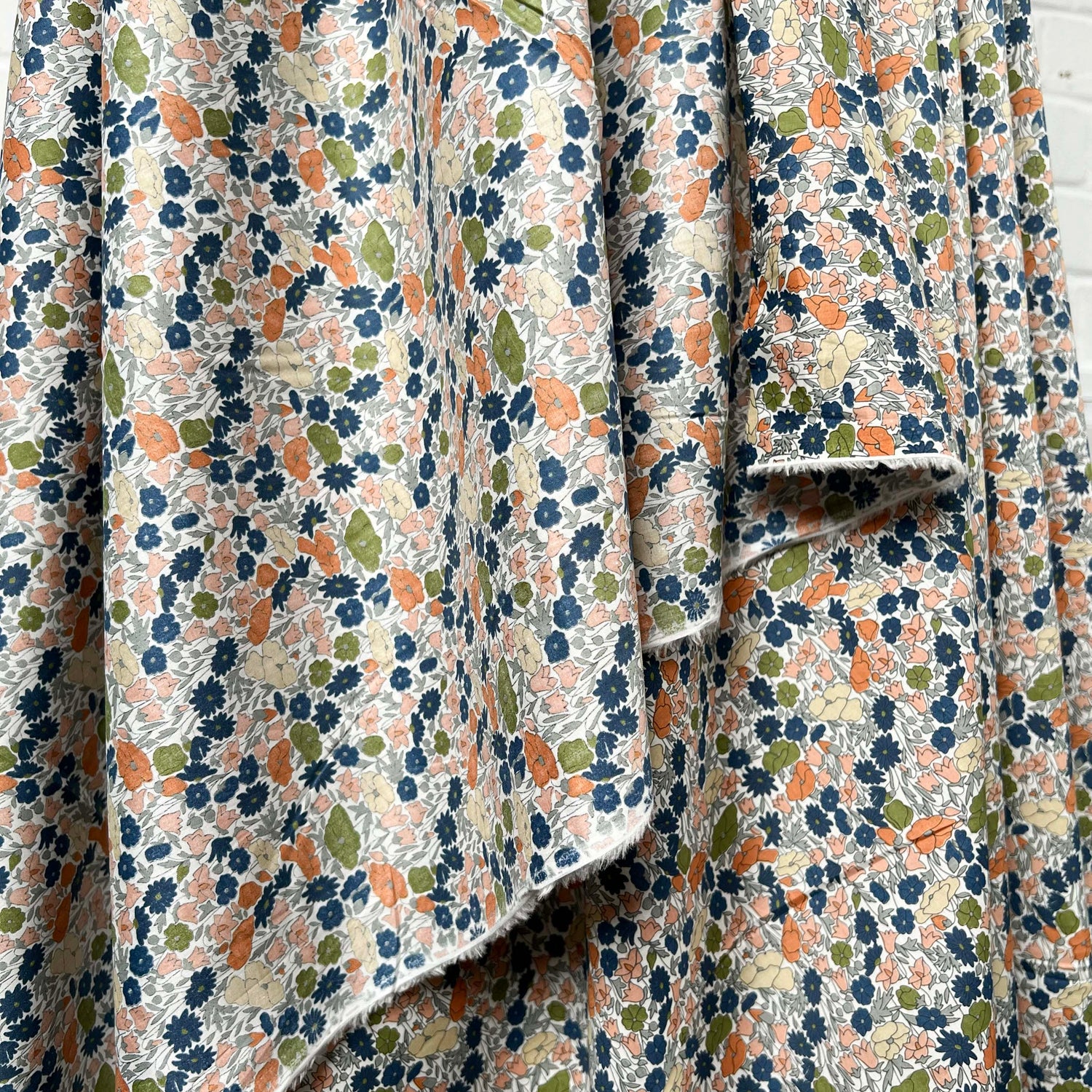 Pima Cotton Lawn Flower Parade Autumn-Orange Blue White Dress Fabric Hang