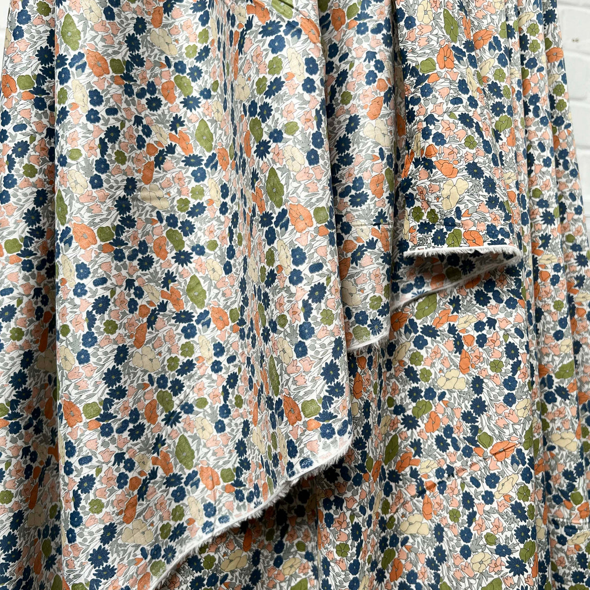Pima Cotton Lawn Flower Parade Autumn-Orange Blue White Dress Fabric Hang