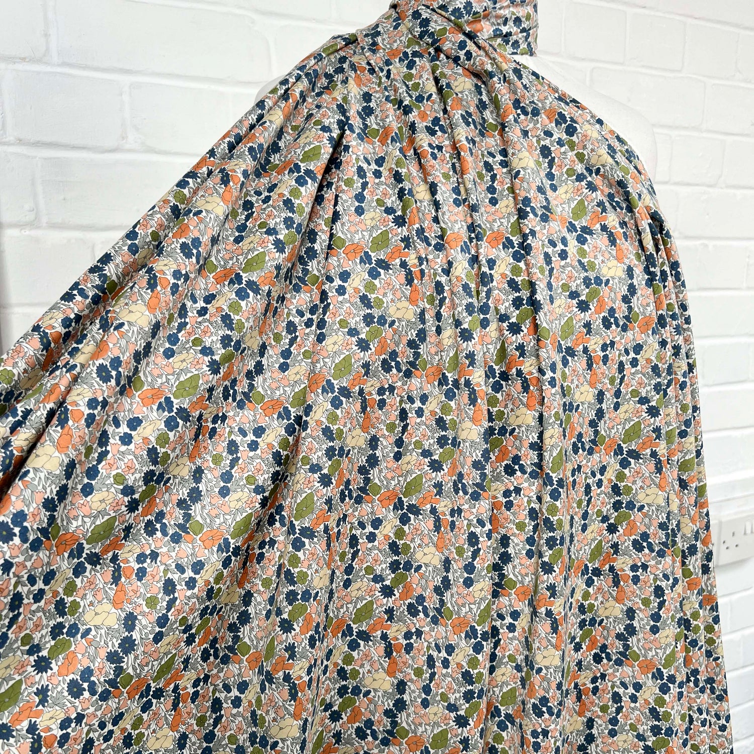 Pima Cotton Lawn Flower Parade Autumn-Orange Blue White Dress Fabric Mannequin