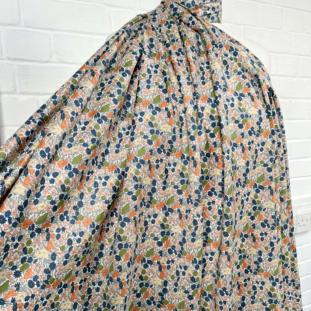 Pima Cotton Lawn Flower Parade Autumn-Orange Blue White Dress Fabric Mannequin