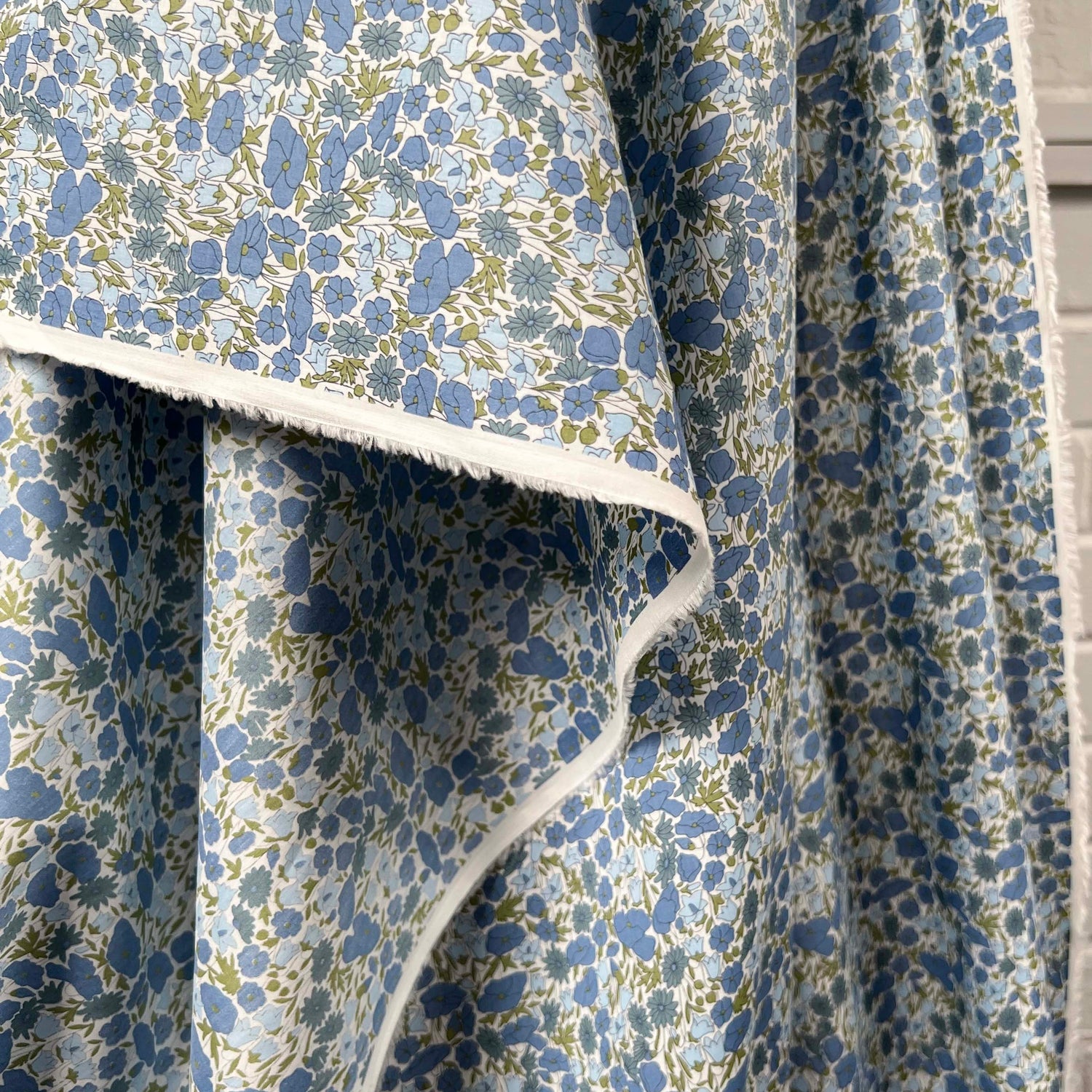 Printed Floral Dress Fabric Pima Cotton Lawn Flower Parade Blue Hang