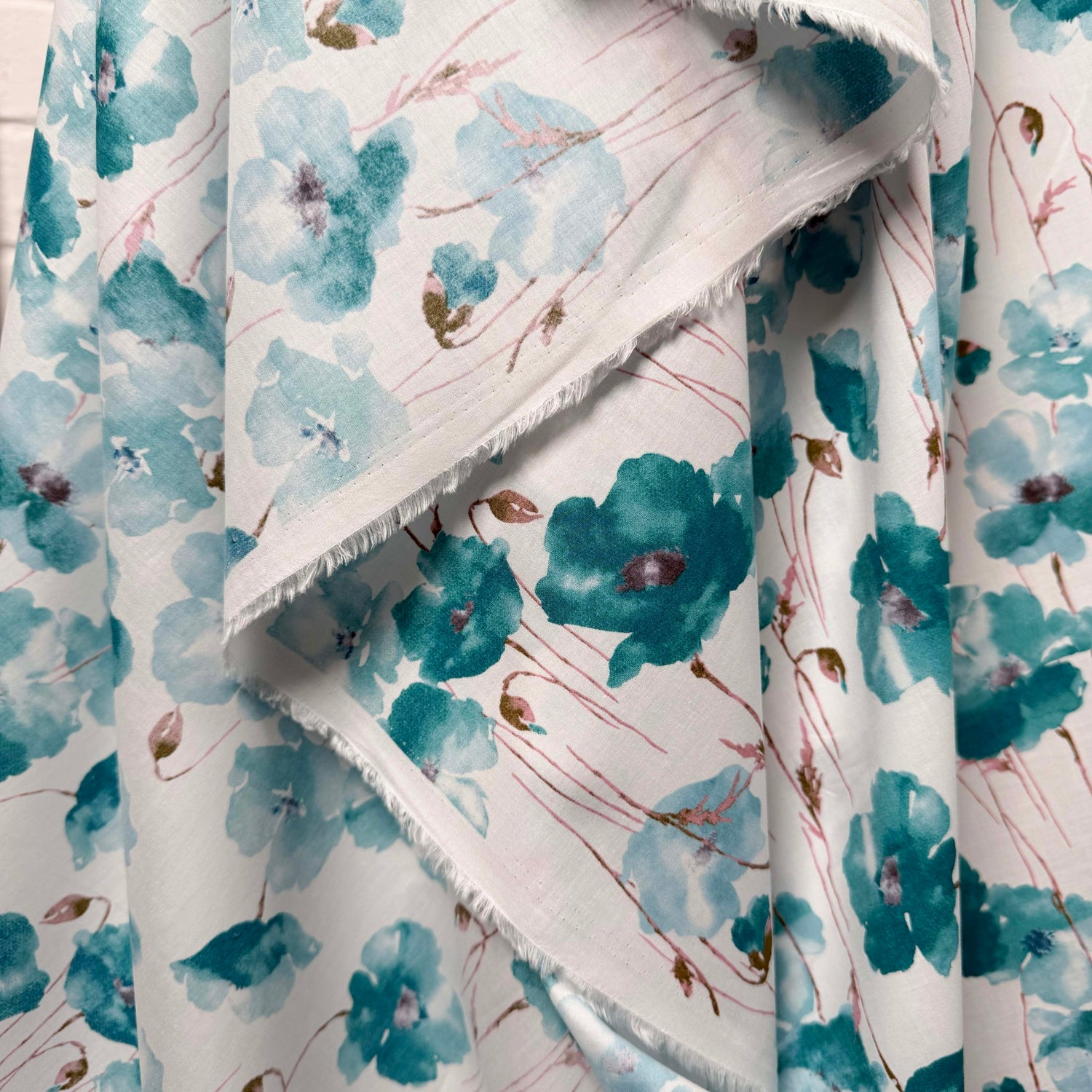 Pima Cotton Lawn Soft Focus Aqua Blue White Floral Dress Fabric Hang