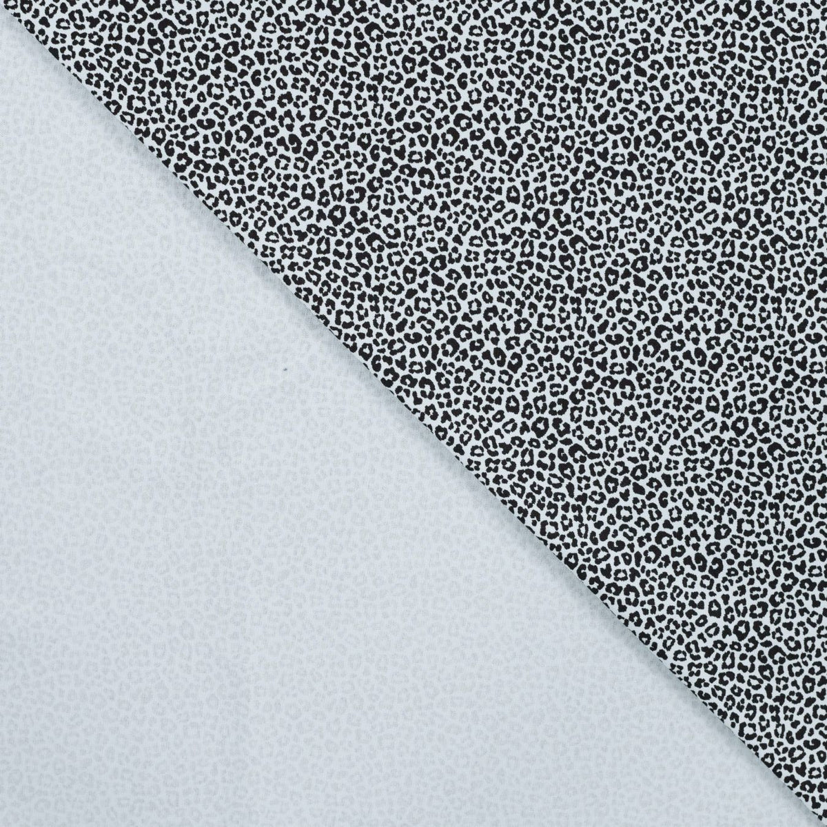 Pocket Panther Haze Animal Print Knitted Cotton Jersey 200gsm Dress Fabric Fold