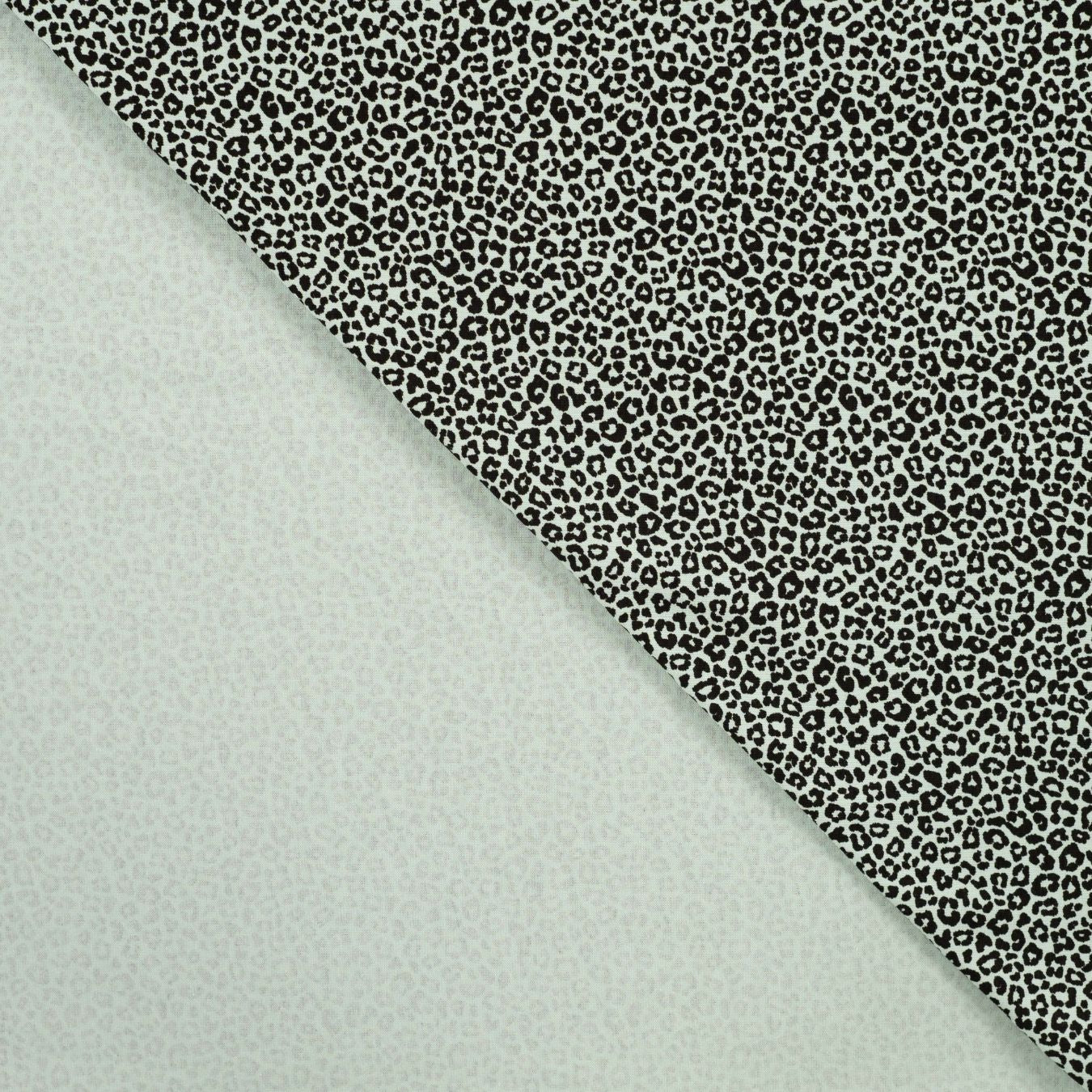 Pocket Panther Mint Animal Print Knitted Cotton Jersey 200gsm Dress Fabric Fold