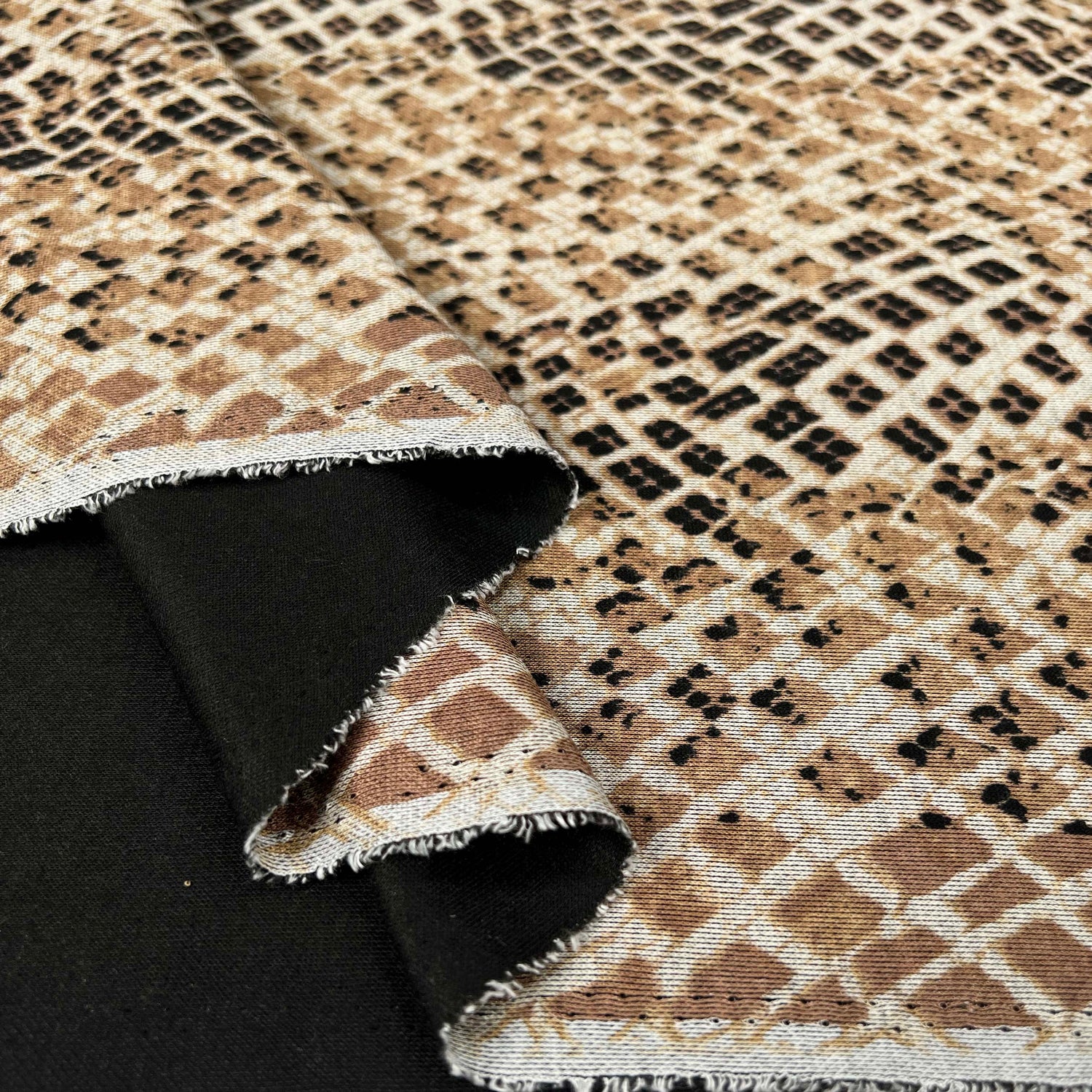 Ponte Roma Basilisk Olive Snake Print Jersey Fabric Fold