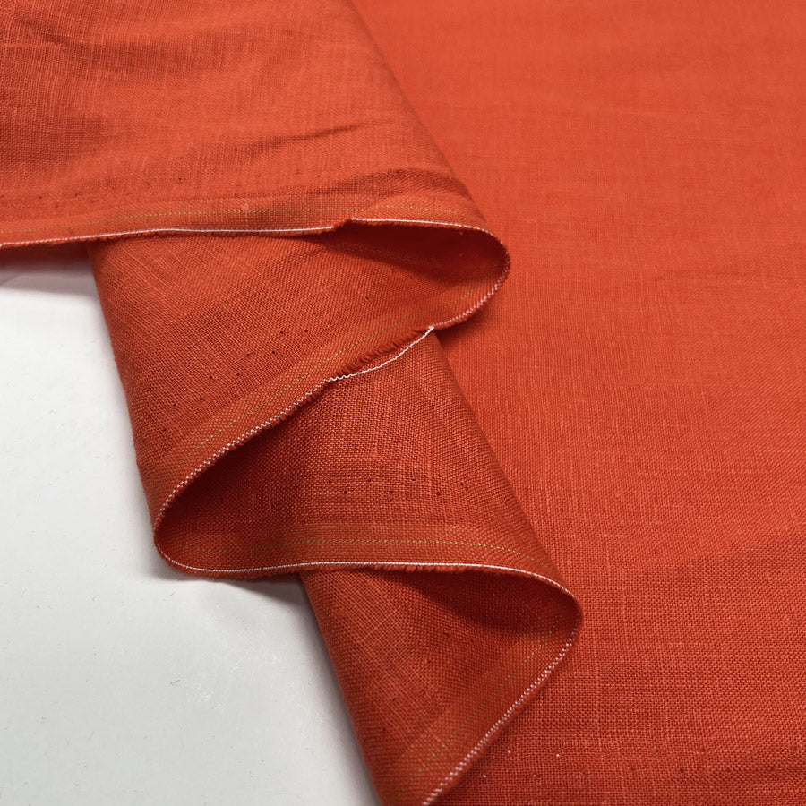 Signature Linen Orange Plain Woven Dress Fabric Fold