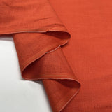 Signature Linen Orange Plain Woven Dress Fabric Fold