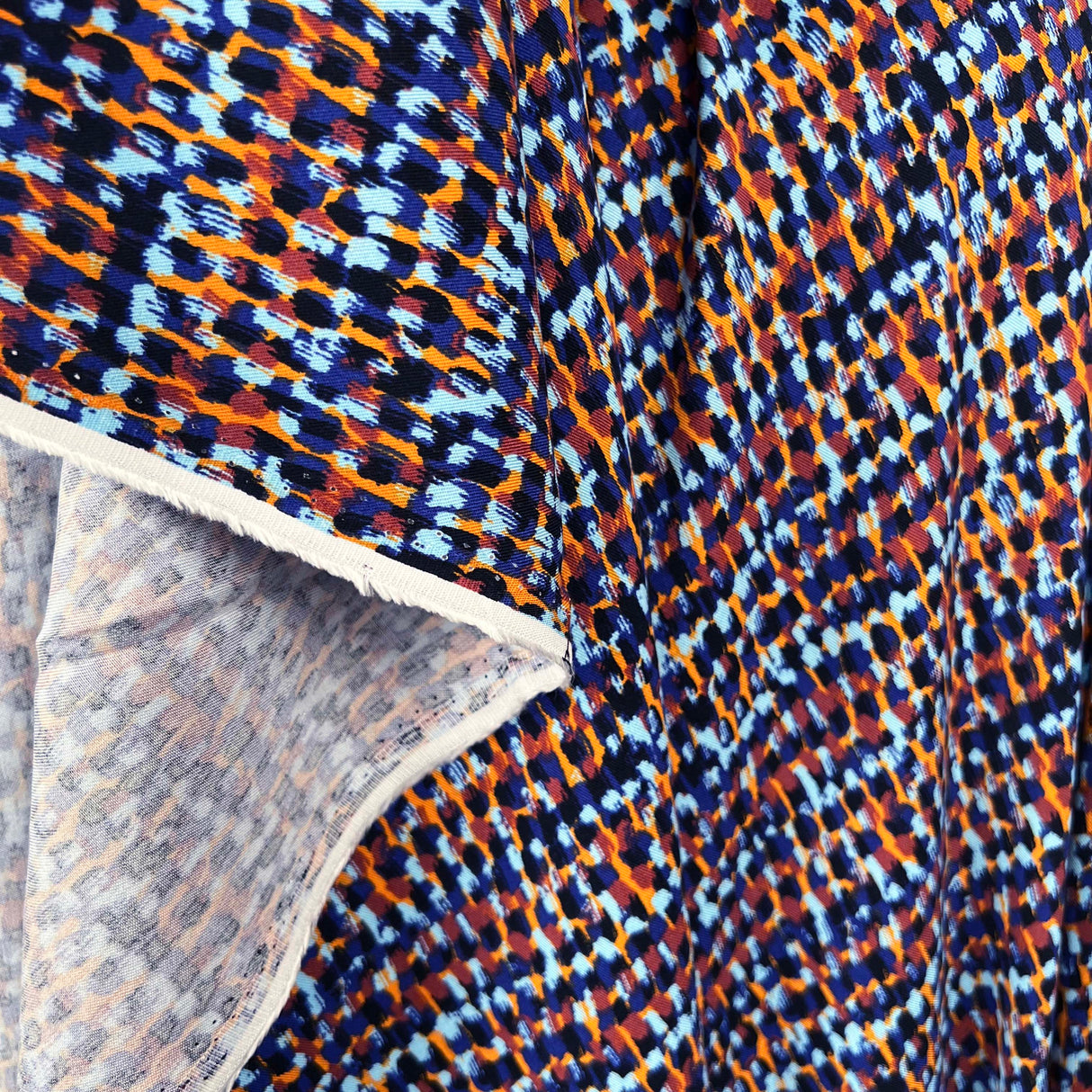 Signature Viscose Mosaic Blue Orange Abstract Dress Fabric Fold