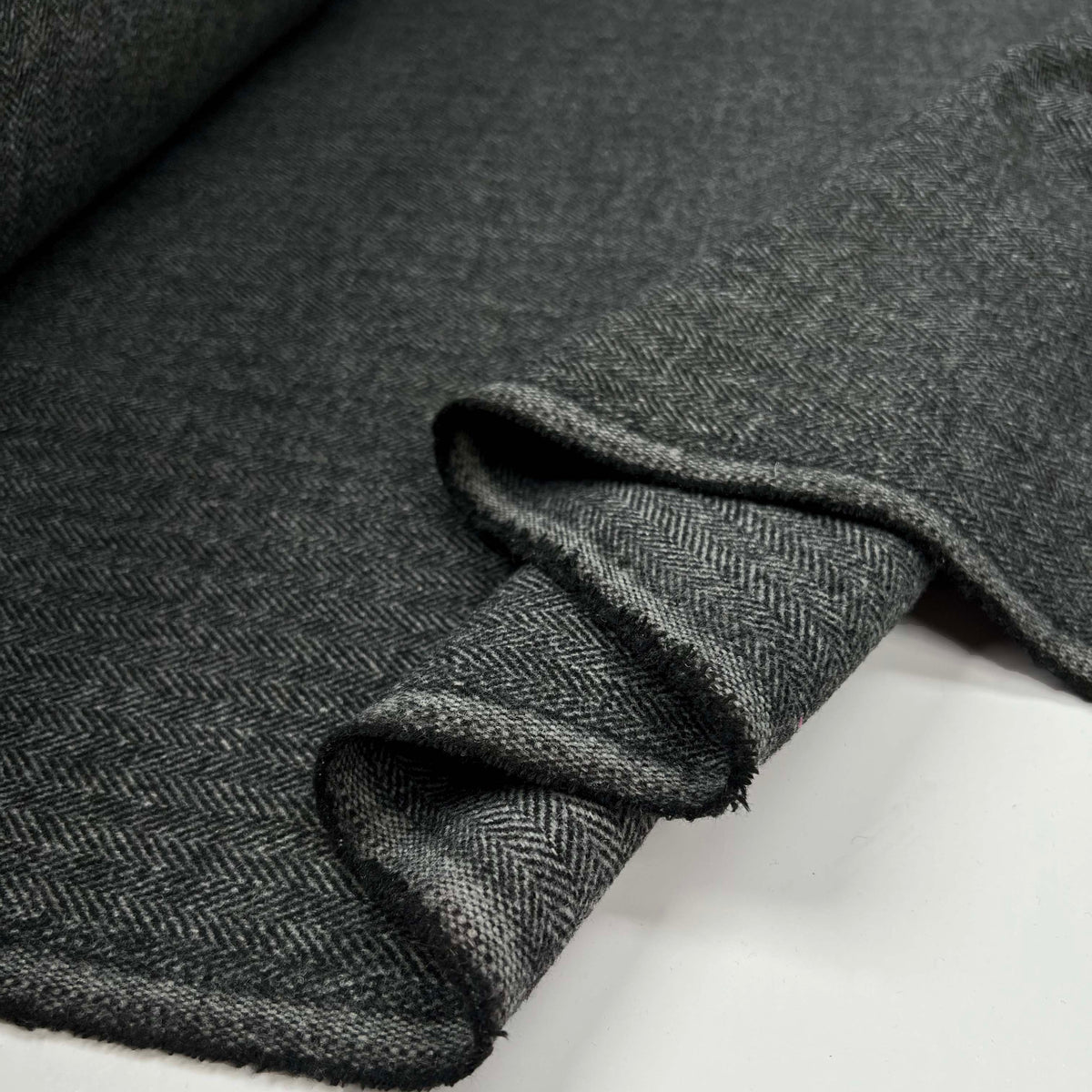 Silent Patient Wool Polyester Mix Black Grey Herringbone Woven Coating Fabric Fold