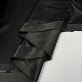 Soft Backed Faux Leather Black Polyurethane Polyester Leatherette Textured Fabric Fold